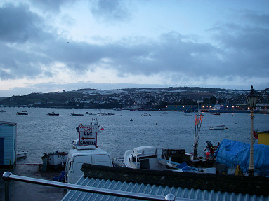 Snow on the hills above Teignmouth Docks at sunset on 8th Feb 2009