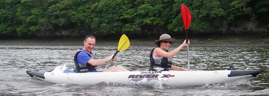 AJ and I in our kayak on the River Fowey - shame we weren't paddling in synch... July 2006